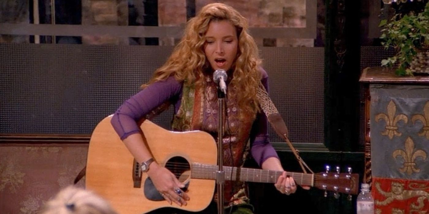 Фиби из сериала "Друзья" играет на гитаре