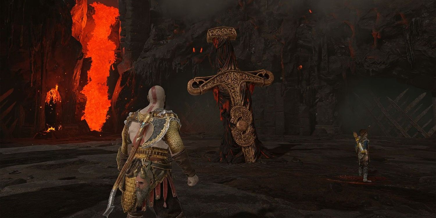God of War Кратос и Атрей стоят вокруг гигантского меча в Муспельгейме