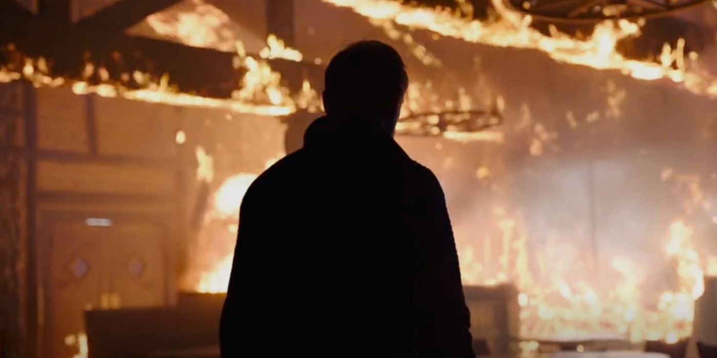 Дэвид стоит на фоне пламени горящего стейкхауса Тодда в 8 эпизоде Last of Us
